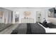 Bedroom featuring modern decor, a mirrored closet, and an ensuite bathroom at 1508 Leighton Ave, Lakeland, FL 33803