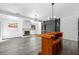 Inviting living room with a fireplace, built-in bar, and ample seating at 1508 Leighton Ave, Lakeland, FL 33803