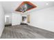 Large living space featuring luxury vinyl floors and recessed lighting at 1508 Leighton Ave, Lakeland, FL 33803