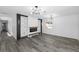 Bright living space with modern built-ins and luxury vinyl floors at 1508 Leighton Ave, Lakeland, FL 33803