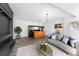 Spacious living area with sleek furniture and modern lighting fixtures at 1508 Leighton Ave, Lakeland, FL 33803