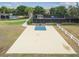 Aerial view of a community basketball court showing the layout and surrounding amenities at 252 Bayou Bend Rd, Groveland, FL 34736