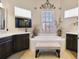 Luxurious main bathroom with a soaking tub and dual vanities at 252 Bayou Bend Rd, Groveland, FL 34736