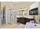 Bathroom showcasing a glass-enclosed shower, soaking tub, vanity area, and neutral color scheme at 252 Bayou Bend Rd, Groveland, FL 34736