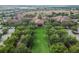 Aerial view of a community center showcasing its beautifully landscaped surroundings and impressive architecture at 252 Bayou Bend Rd, Groveland, FL 34736