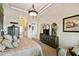 Spacious main bedroom with stylish decor, featuring a dresser and serene natural light at 252 Bayou Bend Rd, Groveland, FL 34736