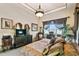 Well-lit main bedroom with elegant furnishings and decor at 252 Bayou Bend Rd, Groveland, FL 34736