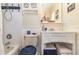 Bright bathroom featuring a classic white vanity, medicine cabinet, and blue decorative accents for a stylish design at 820 Rio Ala Mano Dr, Altamonte Springs, FL 32714