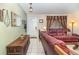 Inviting living room featuring tile floors, a staircase, and a cozy seating area at 820 Rio Ala Mano Dr, Altamonte Springs, FL 32714