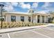 Exterior of the community fitness center featuring ample parking and landscaping at 2537 Cotton Candy Aly, Kissimmee, FL 34744