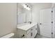 This bathroom features modern fixtures, a white sink, and an oversized mirror at 3083 Voyager Ave, St Cloud, FL 34771