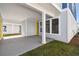 This patio features a concrete floor and supports a light blue painted ceiling at 3083 Voyager Ave, St Cloud, FL 34771