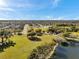 Community park showcasing a serene lake and walking trails within a residential neighborhood at 4706 Rockvale Dr, Kissimmee, FL 34758