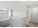 Bright hallway with window and a small linen closet at 4706 Rockvale Dr, Kissimmee, FL 34758