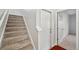 Carpeted staircase leading to the upper level of the home at 4706 Rockvale Dr, Kissimmee, FL 34758