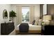 Serene bedroom with a full bed, neutral decor, and a view to the outside through a bright window at 4220 Singing Mockingbird Blvd, Bartow, FL 33830
