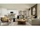 Open-concept living space showcasing the kitchen, modern furnishings, and stylish decor at 4220 Singing Mockingbird Blvd, Bartow, FL 33830
