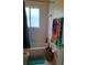 Bright bathroom is clean and has decorative towels at 602 Hillcrest Dr, Davenport, FL 33897