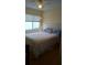 Bright bedroom has carpet, a ceiling fan and lots of light at 602 Hillcrest Dr, Davenport, FL 33897