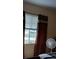 Bedroom with window and curtains at 602 Hillcrest Dr, Davenport, FL 33897