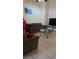 Living room with tile floors, two sofas, and coffee table at 602 Hillcrest Dr, Davenport, FL 33897