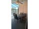 Screened-in patio dining area for outdoor meals and relaxing afternoons at 602 Hillcrest Dr, Davenport, FL 33897