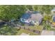 This home has a private fenced yard with patio furniture for outdoor living at 6125 Morningdale Ave, Lakeland, FL 33813