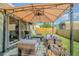 Outdoor patio area with covered seating area, ideal for entertaining and relaxation at 6125 Morningdale Ave, Lakeland, FL 33813
