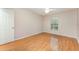 Bedroom featuring hardwood floors and a window at 2076 Whispering Trails Blvd, Winter Haven, FL 33884