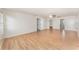 Bright bedroom featuring laminate flooring, a ceiling fan, and white trim at 265 Elderberry Dr, Davenport, FL 33897