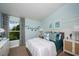 Cozy bedroom with two-toned walls, accent pillows, and side tables at 1018 Brimstone Cir, Winter Haven, FL 33884