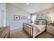 This bedroom features crown molding and a leaf design on the wall at 1018 Brimstone Cir, Winter Haven, FL 33884