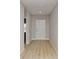 Entryway with wood floors and a white front door at 1018 Foreshore Ln, Haines City, FL 33844