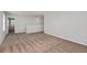 Bright loft area with neutral carpeting and paint provides a versatile space at 1018 Foreshore Ln, Haines City, FL 33844
