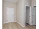 Entryway features vinyl floors, a front door, and doorways to other rooms at 1026 Foreshore Ln, Haines City, FL 33844
