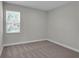 Neutral bedroom with carpet and a window offering natural light at 17745 Sw 25Th Ave Rd, Ocala, FL 34473