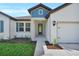 Charming single-Gathering home featuring manicured lawn and inviting entrance at 17745 Sw 25Th Ave Rd, Ocala, FL 34473