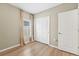 Bedroom with hardwood flooring and a sliding door closet at 2047 Rosewood Cir, Lakeland, FL 33810