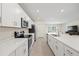 Stylish kitchen featuring a long island, stainless steel appliances, and ample cabinet space at 2047 Rosewood Cir, Lakeland, FL 33810