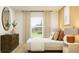 Comfortable bedroom featuring a bed with plush pillows, dresser with round mirror, and neutral tones for a serene retreat at 1261 Deepwater Cir, Eagle Lake, FL 33839