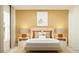 Cozy bedroom with a modern platform bed, matching bedside tables, and a serene color scheme for a relaxing atmosphere at 1261 Deepwater Cir, Eagle Lake, FL 33839