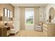 Cozy Bedroom with white crib, neutral tones, decorative art, and jute rug provides a soothing and stylish space at 1261 Deepwater Cir, Eagle Lake, FL 33839