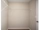 Walk-in closet with shelving and neutral paint at 1570 Sage Ave, Haines City, FL 33844