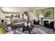 Open concept living area with stylish furniture and decor at 1574 Sage Ave, Haines City, FL 33844