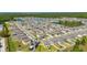 Aerial view of homes in a community near lakes and ponds at 1792 Yellow Trl, Lakeland, FL 33801