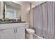 Cozy bathroom featuring white cabinets with granite countertops and a shower-tub combination at 1792 Yellow Trl, Lakeland, FL 33801