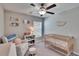 This bedroom has soft lighting and plenty of room to play and rest at 1792 Yellow Trl, Lakeland, FL 33801