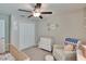 This bedroom has soft lighting and plenty of room to play and rest at 1792 Yellow Trl, Lakeland, FL 33801