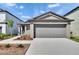 Charming single Gathering home with a well-manicured lawn and two car garage at 1792 Yellow Trl, Lakeland, FL 33801