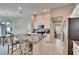 Bright kitchen featuring a center island, stainless steel appliances, and white cabinetry at 1792 Yellow Trl, Lakeland, FL 33801